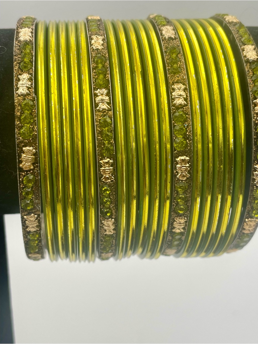 Green and Gold Stack Metal Bangle Bracelet Set. 19 Bracelets. 7 1/2 to 7 3/4 in